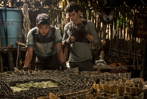 THE MAZE RUNNER Minho (Ki Hong Lee, left) and Thomas (Dylan O'Brien, right) devise an escape plan. Ph: Ben Rothstein TM and © 2014 Twentieth Century Fox Film Corporation.  All Rights Reserved.  Not for sale or duplication.